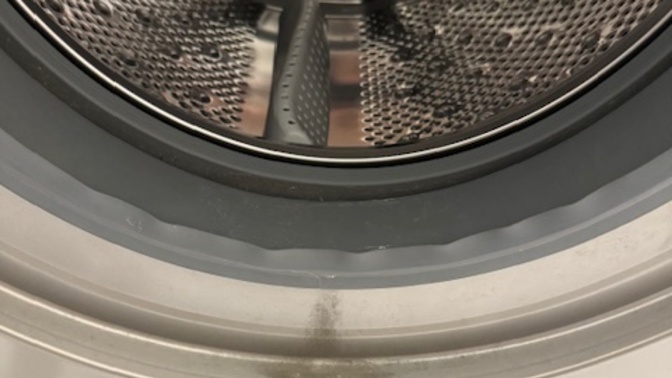 Why does the rubber ring on my laundry machine always gets crinkled?