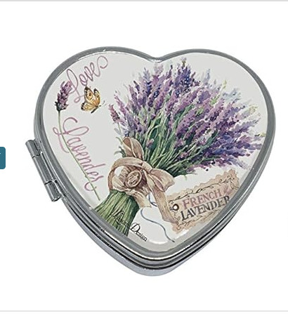 Which pill organizer is cuter to carry on?