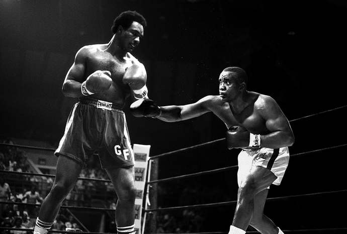 Who would win a hypothetical boxing match between 1958 Sonny Liston and 1973 George Foreman?