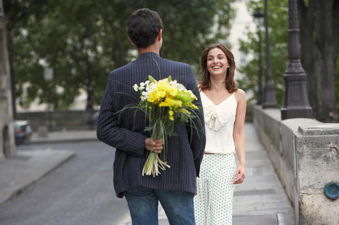 Is bringing a girl flowers on a first date way too old fashioned?