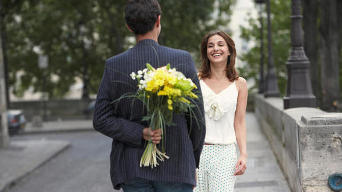 Is bringing a girl flowers on a first date way too old fashioned?