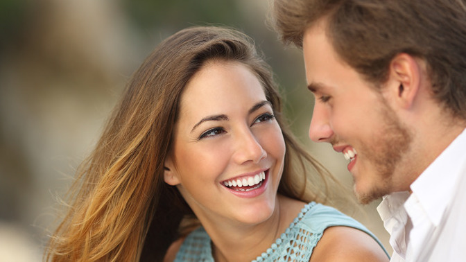 Does a girl saying a guy has a great smile the same as saying he's cute? Is it flirting?
