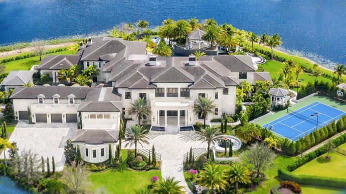 If you are a millionaire with lots of money to spare, would you rather live in a mansion or standard house and why?