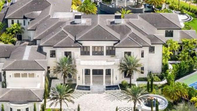 If you are a millionaire with lots of money to spare, would you rather live in a mansion or standard house and why?