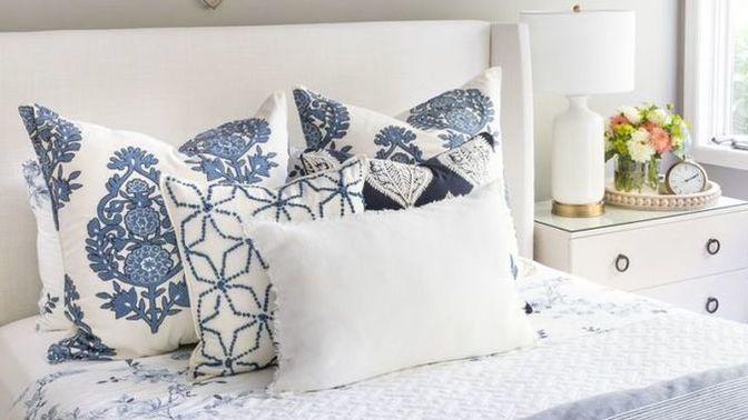 Do you have a mountain of pillows on your bed?