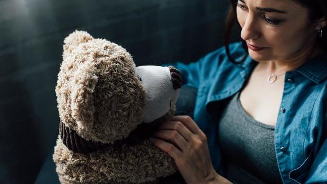 Why would a girl hold onto items from a previous relationship?