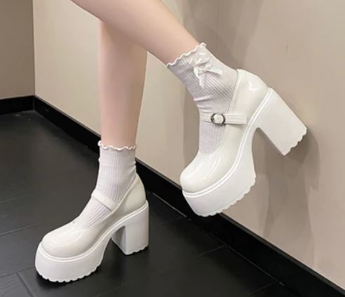 What shoes would u pick to wear while wearing a black knife pleated skirt?