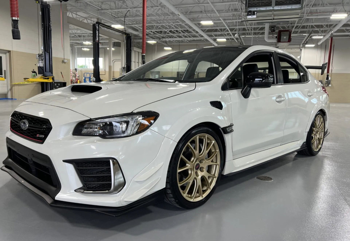 Dodge avenger rt or subaru WRX?
