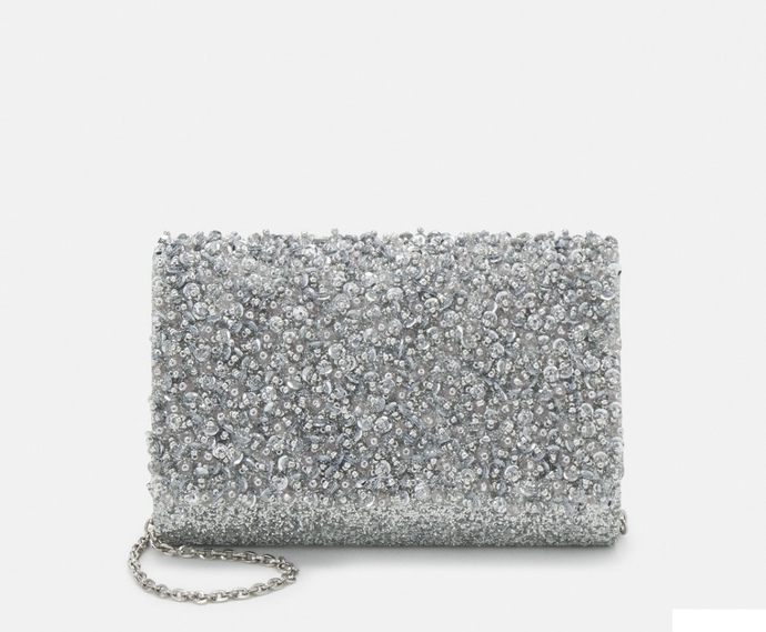 Which clutch and heels would suit this beautiful dress for wedding?