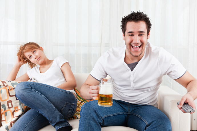 Girls, do you humor your guy by watching sports? Guys, does your girl do this, or is she genuinely into it?