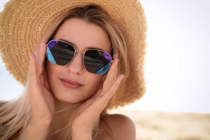 What does it mean when girl always wears sunglasses when she meets a particular guy?