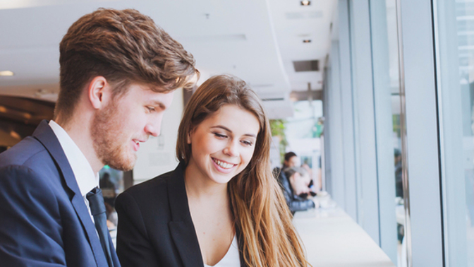 How to handle guy who likes my girlfriend, who works in same organisation?