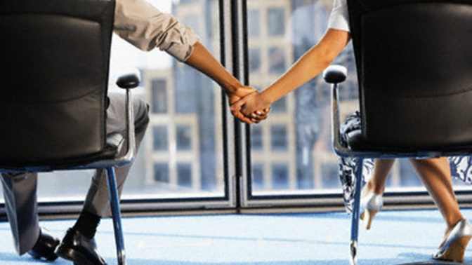 What is the major concern about allowing romance in the workplace?