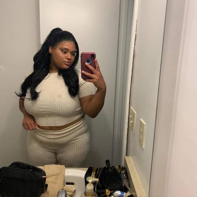 Why do so many women think fat is sexy. And why does she have a food stain on her shirt?