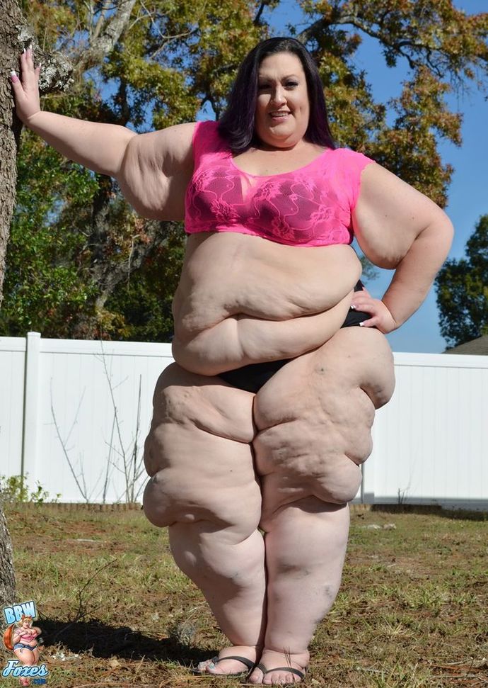 Why do so many women think fat is sexy. And why does she have a food stain on her shirt?