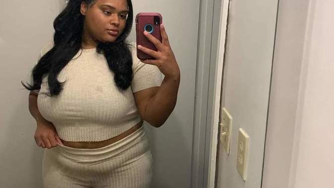 Why do so many women think fat is sexy. And why does she have a food stain on her shirt?