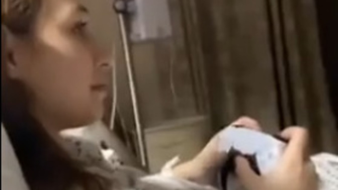 Girls, would YOU play video games after giving birth like this mom here?