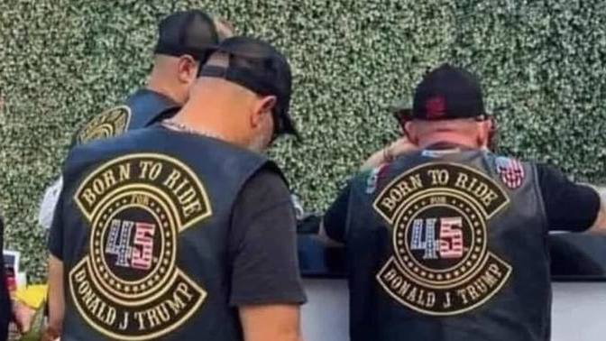 What song are they playing as they are riding in the streets or going into the biker bars?