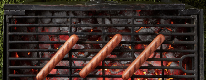 How should hotdogs be grilled?