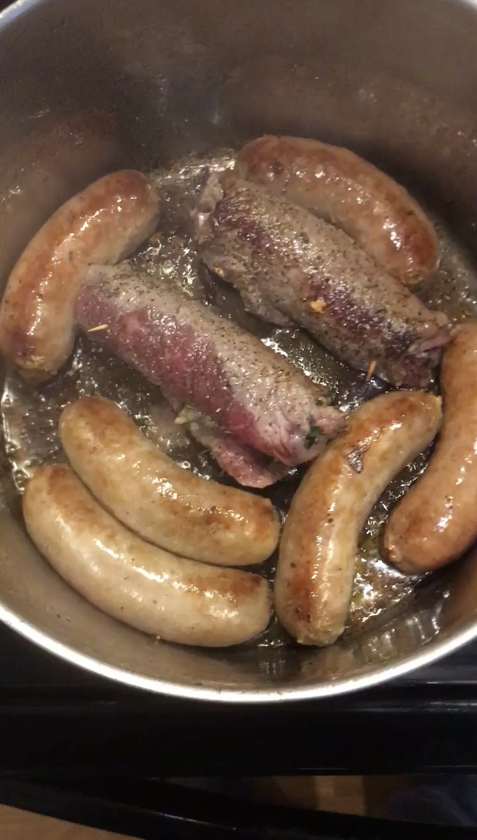 Cook the hot Italian sausage, sweet Italian sausage, and homemade braciole in the onion/garlic oil
