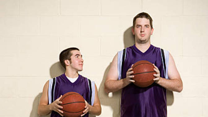 Why do taller men make sure to mention their height all the time?
