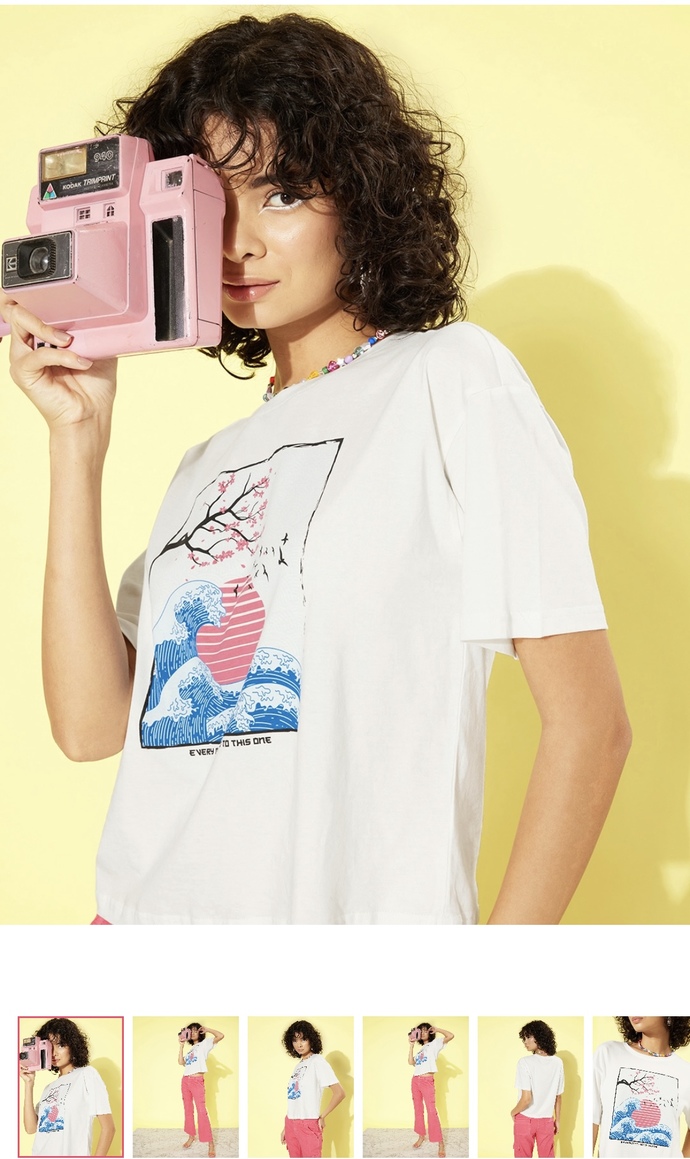 Which T-shirt should I buy for my girlfriend to wear casually with straight fit jeans?