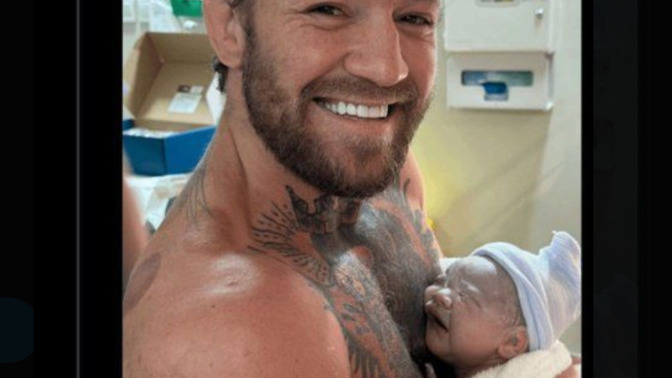 Is a father holding his new born child like this creepy?