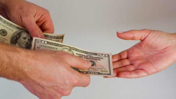 Should my partner split bills 50/50 if he earns more than me? He just gives me 100 a week towards everything for us and our children?