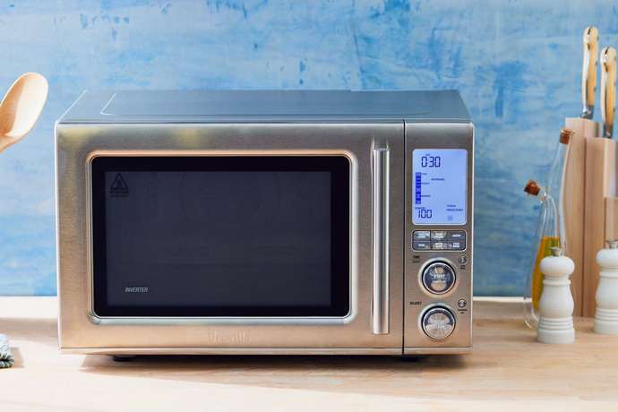 A microwave can fast forward time by heating up the food much more quickly, does that technically mean a microwave is a time machine?