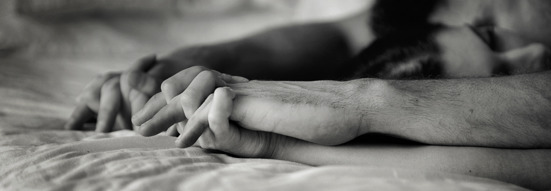 Can friends hold hands in bed while watching a movie?