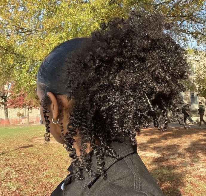 Is it a common perception that curly hair is seen as cute rather than attractive?