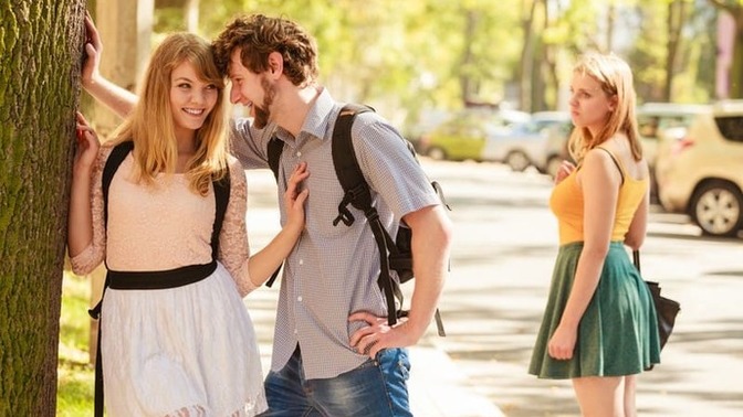 Why does a girl with a boyfriend look upset when I look at other women?