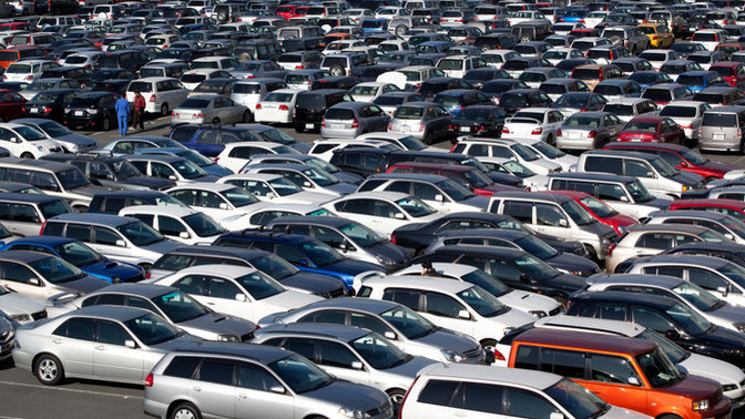 Why are cars less colorful today than in decades before?