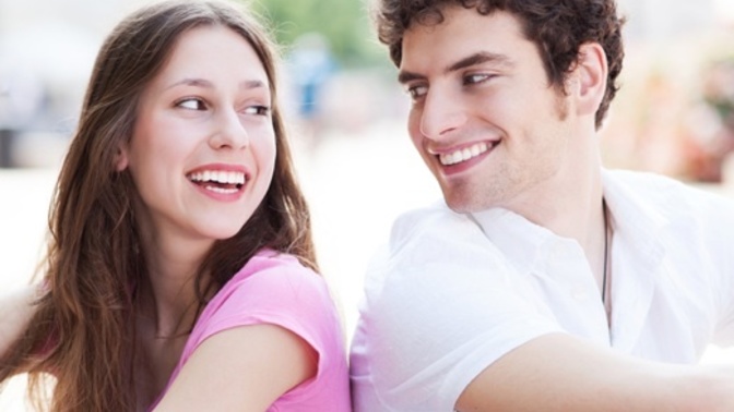 My guy friend is recently flirty after we spent a vacation just the two of us and I'm wondering if he likes me in that way?