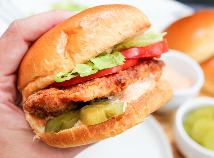 Which one do you like better? A chicken burger or a regular hamburger?