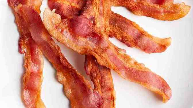 How can you tell when bacon is ready/cooked?