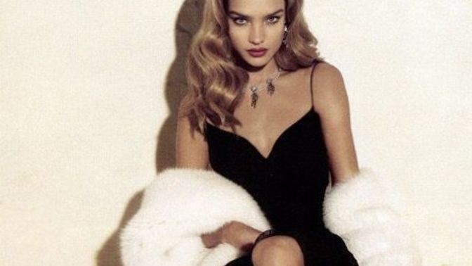 Which outfit gives the most femme fatale vibes?