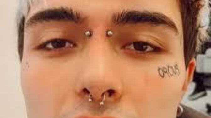 Men who wear piercings are very handsome, aren't they?