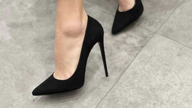 I am trying to walk in heels to get ready for my wedding day. How can I reduce the pain of wearing heels for several hours?