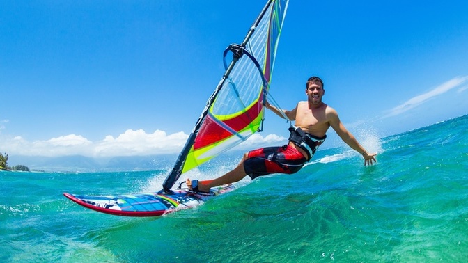 Surfing, Windsurfing or swimming? What would be your choice?