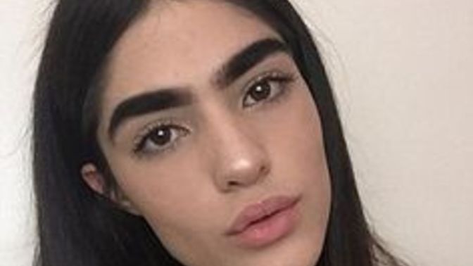 Is it it weird to not mind dating a woman with big bushy eyebrows?