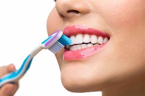 How do you remove FOOD PARTICLES from between your TEETH?