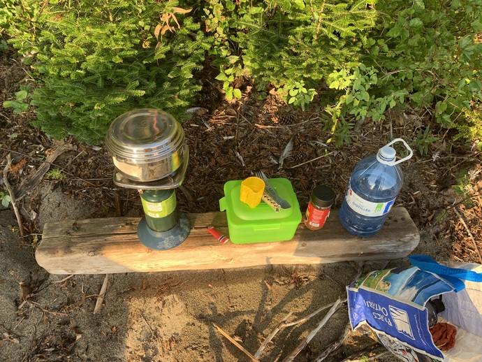 Boiling water to make coffee around 5 AM on an island beach site that is 15 km away from the mainland/civilization.