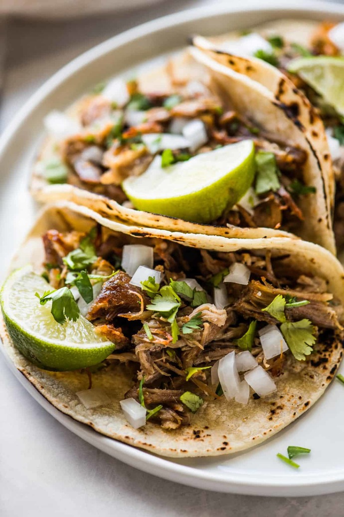 Carnitas tacos or chicken enchiladas ?