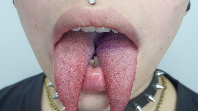 Why do people split their tongues in half?
