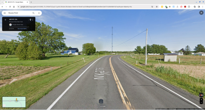 House on left in Canada; house on right in USA.