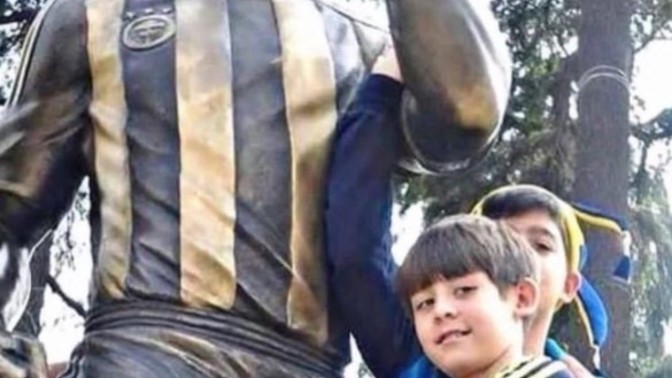 Does anyone know this young boy?