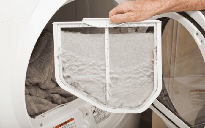 Do you clean the lint trap before you start a new load, or after the load has finished drying?