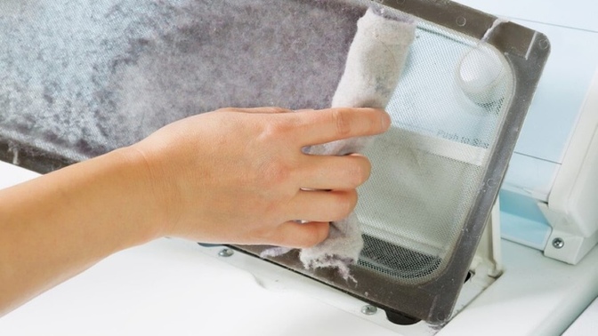 Do you clean the lint trap before you start a new load, or after the load has finished drying?