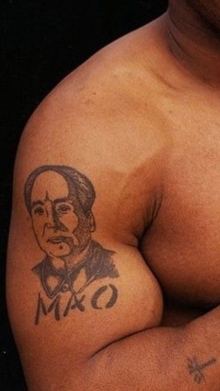 Which tattoo on the shoulder looks better by design and placement?